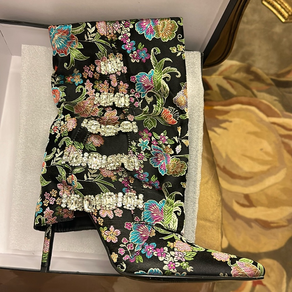 Beautiful black tapestry pattern boots with rhinestone slide. NEW, size 10.